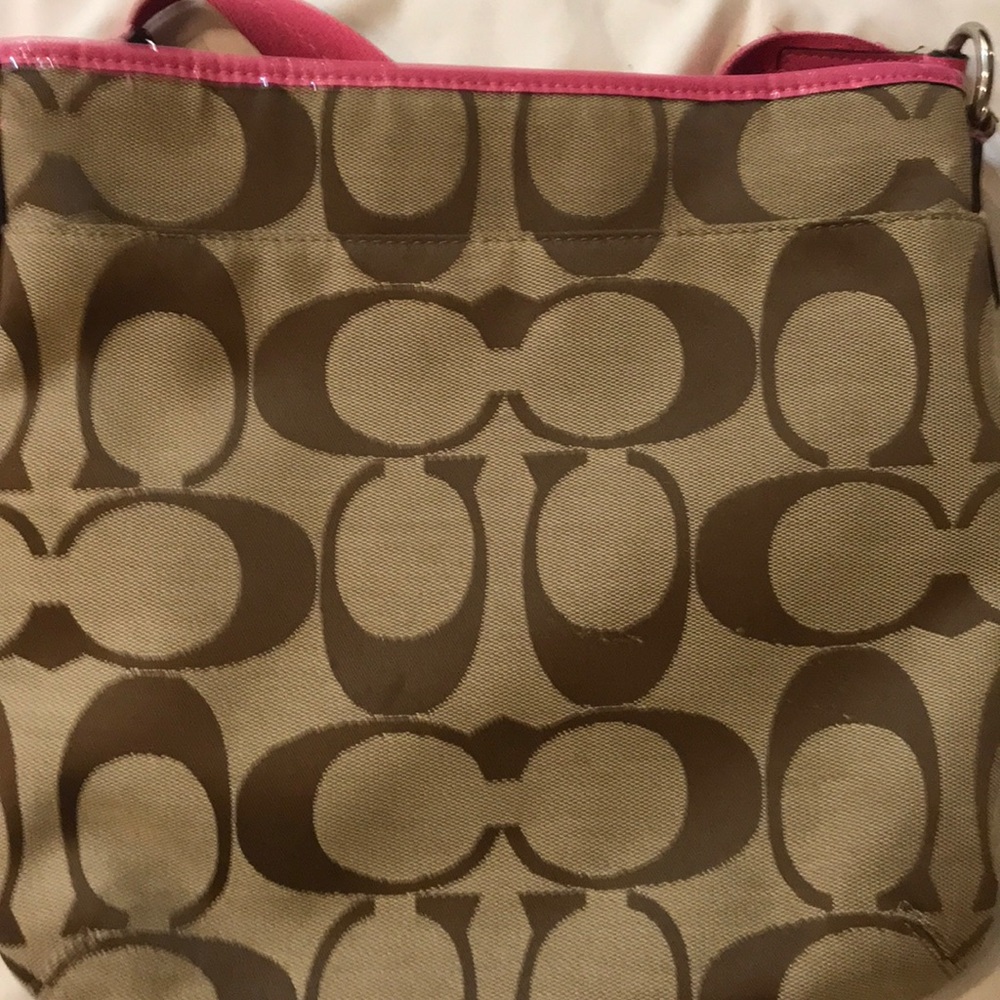Pink and brown coach body cross bag